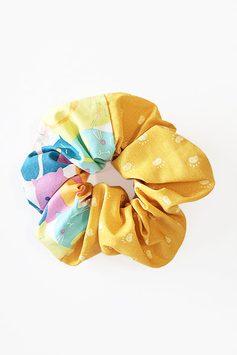 colorful cats print and yellow paw prints upcycled fabric scrap scrunchie