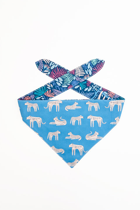 tiger print side of jungle friends reversible pet bandana. prints feature jungle animals, plants and tigers on blue backgrounds.