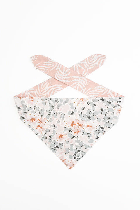watercolor floral print side of watercolor ferns reversible pet bandana. prints feature pastel shades of pink and green.