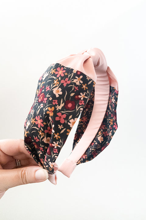 side view of a lucky franklin headband handmade using upcycled 100% premium cotton fabric scraps with a tiny floral print and blush pink solid