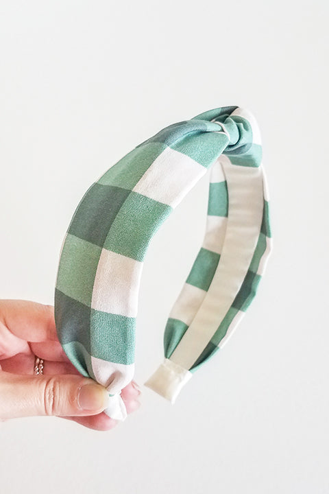 side view upcycled handmade headband made from a 100% cotton fabric scraps in a verdant plaid check print with green and cream.
