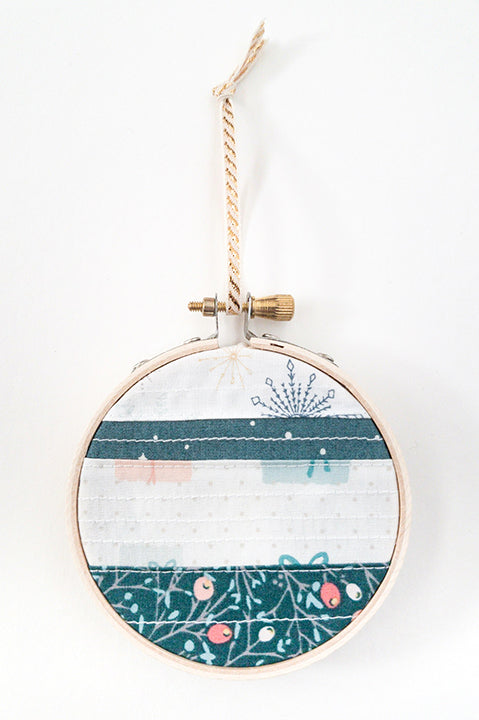 3 inch diameter wooden embroidery hoop ornament crafted from quilted scrap fabric in holiday and christmas prints - horizontal stripes 3