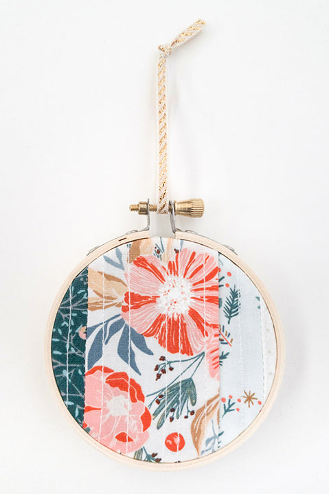 3 inch diameter wooden embroidery hoop ornament crafted from quilted scrap fabric in holiday and christmas prints - vertical stripes 2