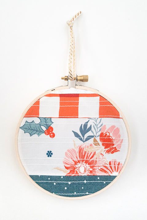 4 inch diameter wooden embroidery hoop ornament crafted from quilted scrap fabric in holiday and christmas prints - horizontal stripes 1