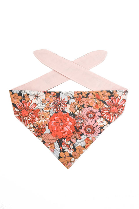 100% premium cotton reversible 2 in 1 pet bandana made in a rustic blooms floral print for the front and a blush pink solid fabric for the reverse